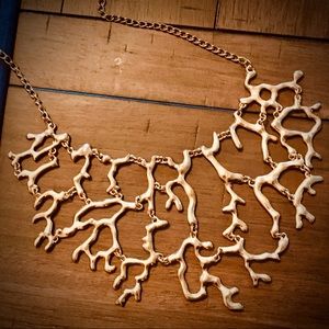 Gold tone coral necklace